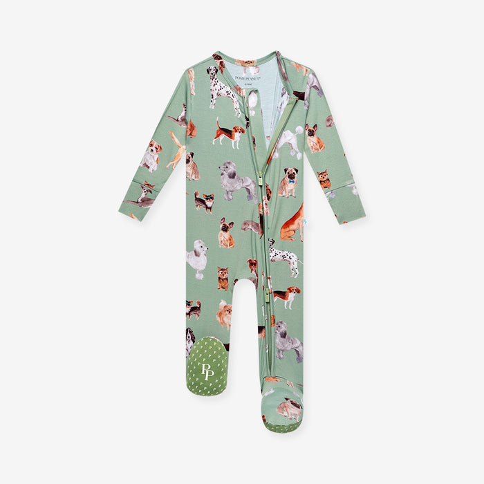 Front image of dog printed one piece half zipped and showing footie detail