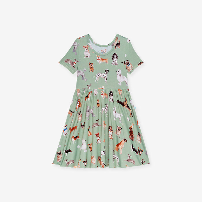 Front image of green dress with dog pattern print