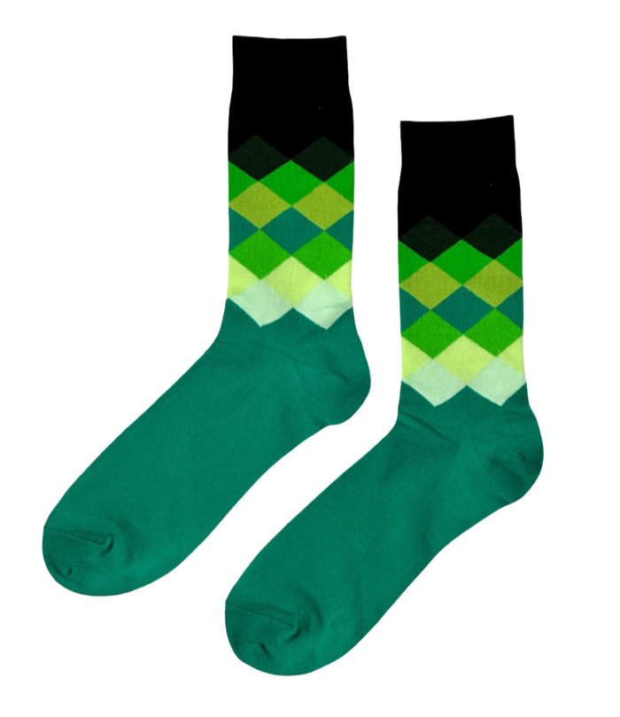 Prestige Verdant socks on white background showing full deep green tone from cuff to foot