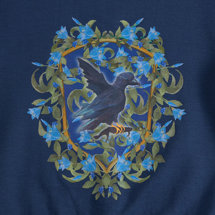 Close-up of Harry Potter Ravenclaw crest graphic on sweatshirt