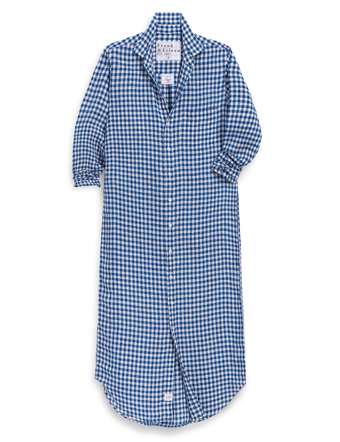 Blue and white checkered shirt dress on a white background