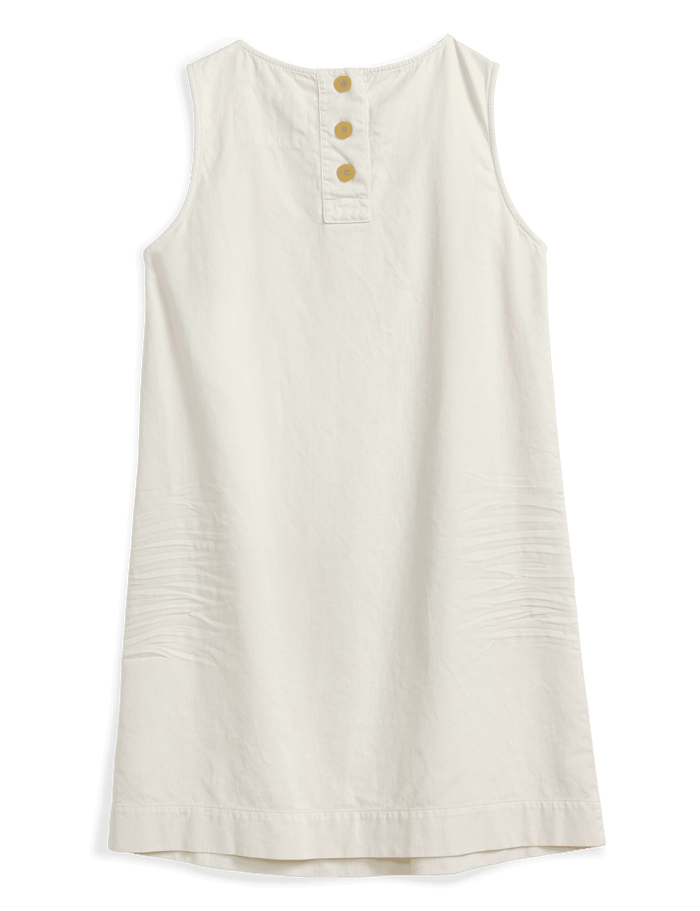 An off-white sleeveless shift dress with a three-button henley neckline, shown flat against a solid dark green background.