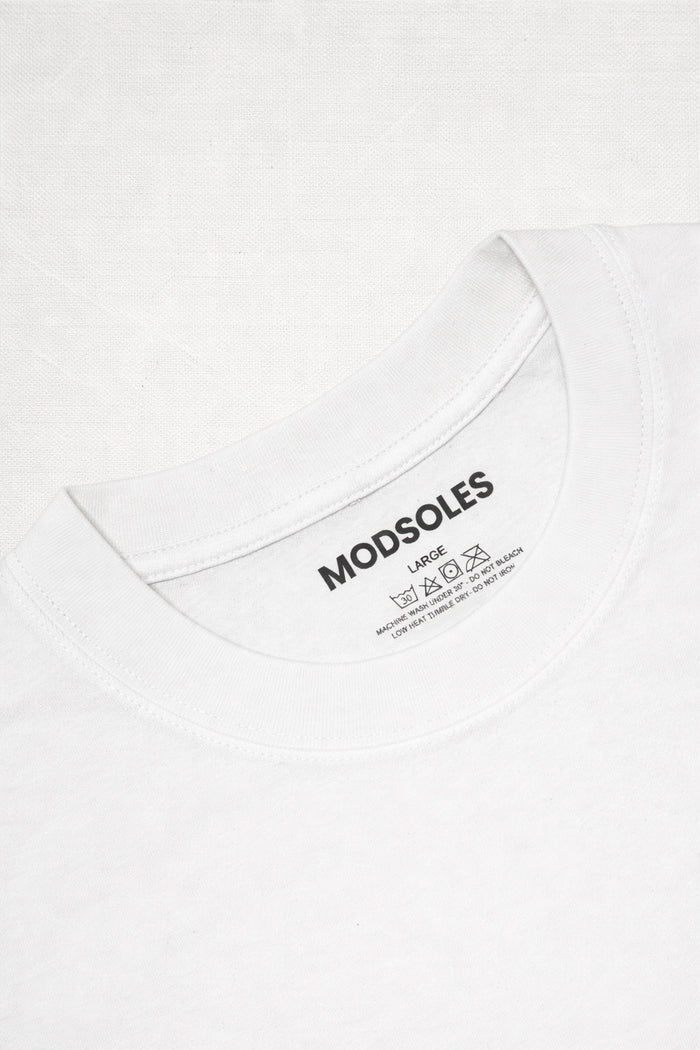 Standard-Fit Crew-Neck T-Shirt neck label close-up in white cotton