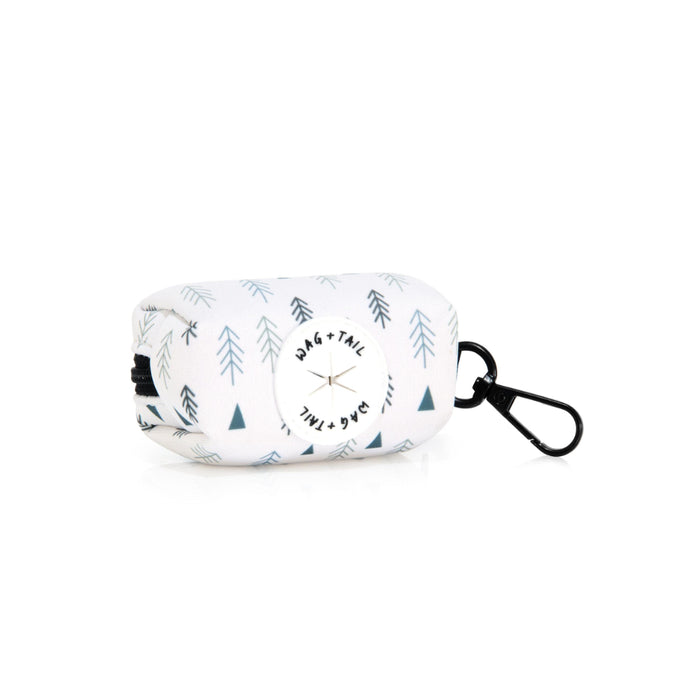 Wag + Tail Frosted Pines waste bag holder showing pine-print clip-on dispenser flat lay