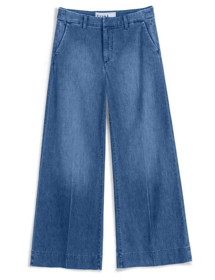 Blue denim wide-leg pants on a transparent background