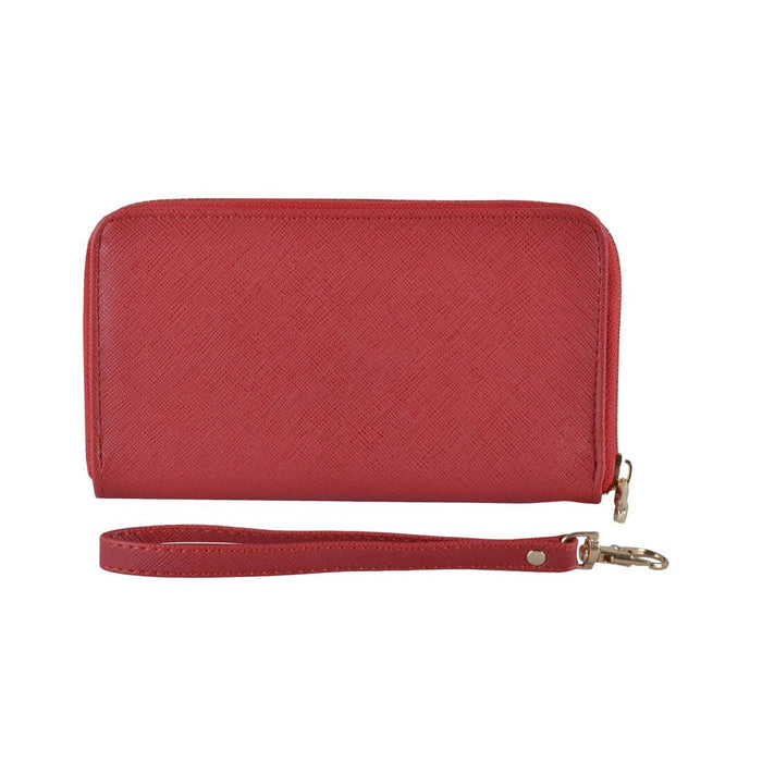 Red faux leather purse with wrist strap on a white background