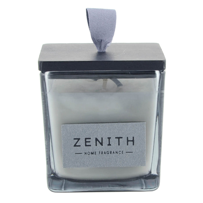 Candle in a glass container with a black lid labeled 'Zenith Home Fragrance' on a white background
